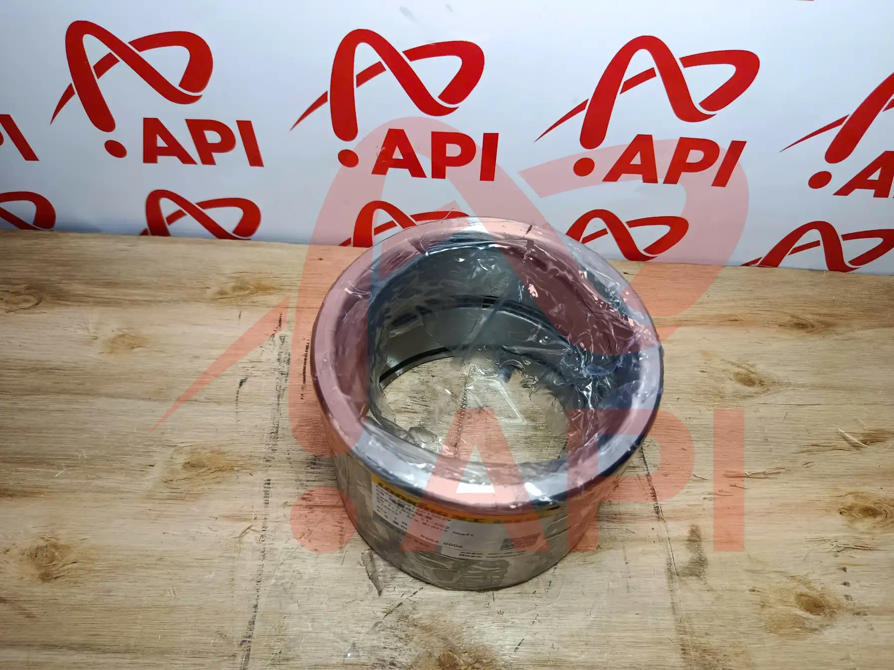 Bạc trục giữa tay gật xúc lật Lonking ZL50NC 60916010029 - chụp góc trên