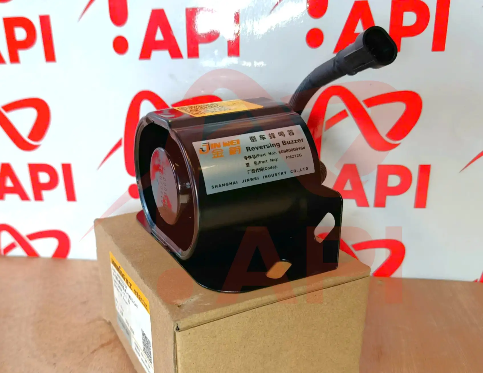Còi báo lùi 60980000164 xúc lật Lonking - mặt bên của còi